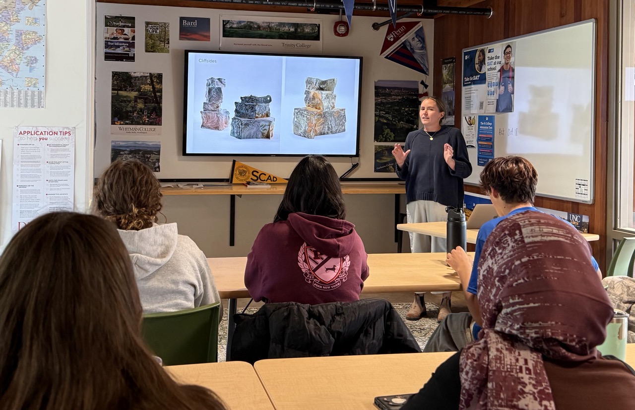Sara Jensen '19 presenting to students
