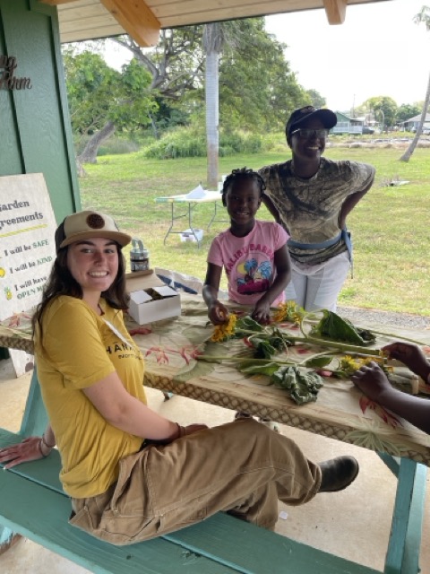 Kira on her Senior Project on a farm